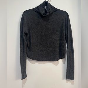 Scoop hem turtle neck top